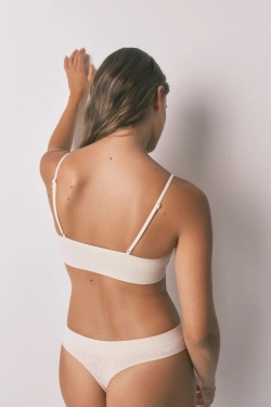 Безшовний топ з анімалістичним принтом бежевого кольору