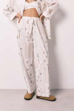 Длинные брюки из 100% хлопка с цветочным принтом