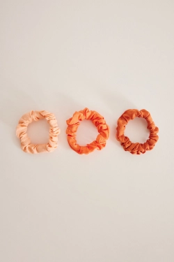 Набор из трех пар резинок для волос оранжевого цвета