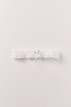 Пояс для панчіх з мережива білого кольору