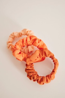 Набор из трех пар резинок для волос оранжевого цвета