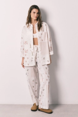 Длинные брюки из 100% хлопка с цветочным принтом