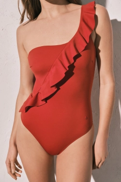 Купальник коригуючий асиметричний з воланом помаранчевий