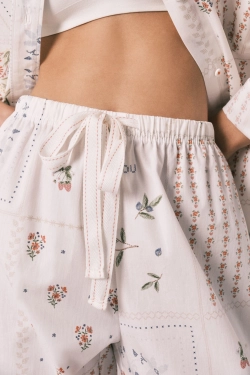 Длинные брюки из 100% хлопка с цветочным принтом